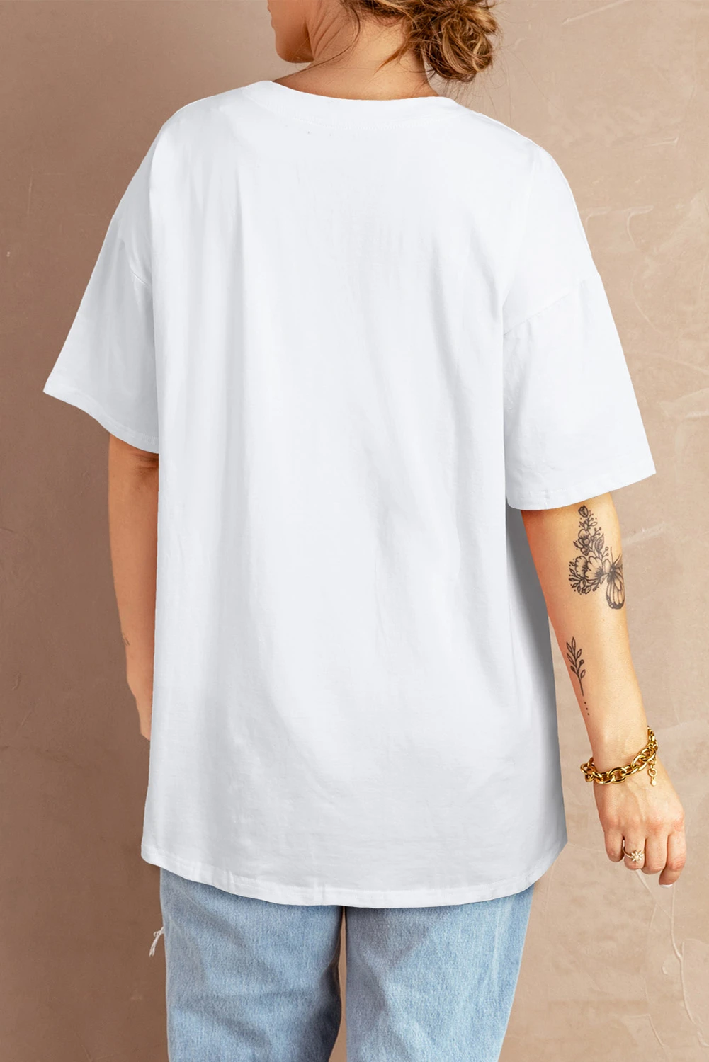 白色圆领短袖宽松版型小孔破洞设计休闲女士T恤 LC2523247