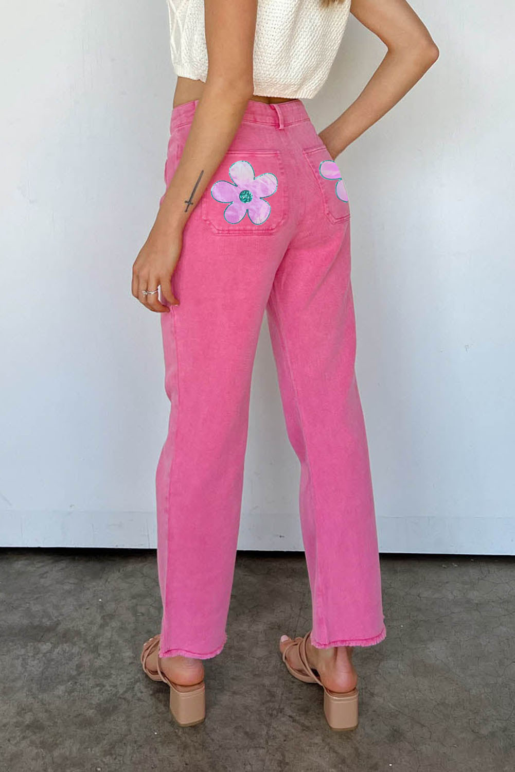 粉色花朵图案毛边喇叭牛仔裤 LC7712742