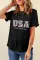 黑色豹纹 UAS 字母标语图案 T 恤