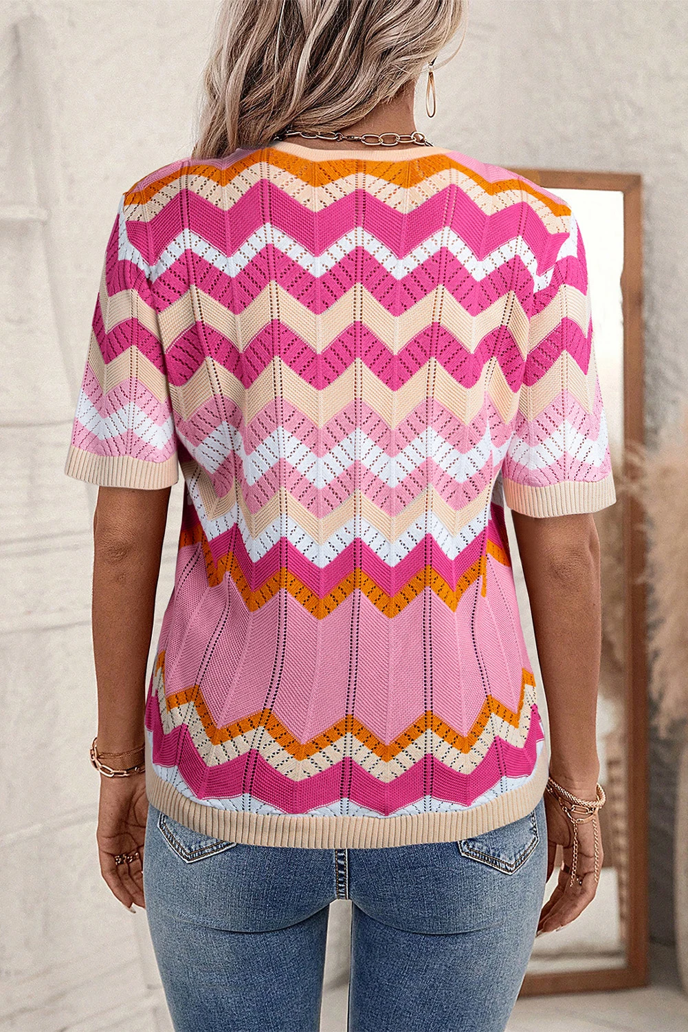 粉色条纹 V 字形挑窿针织 V 领短袖毛衣 LC2724563