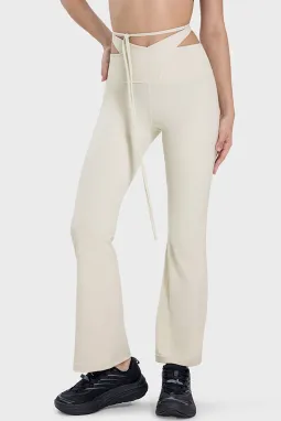 白色拱形镂空腰系带喇叭运动裤