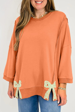 西柚橙色花卉蝴蝶结贴片外露接缝拼布开衩宽松卫衣