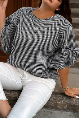 黑色加大号格子蝴蝶结装饰喇叭袖圆领毛衣