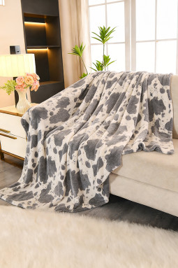 中灰色超柔软法兰绒奶牛印花毛毯