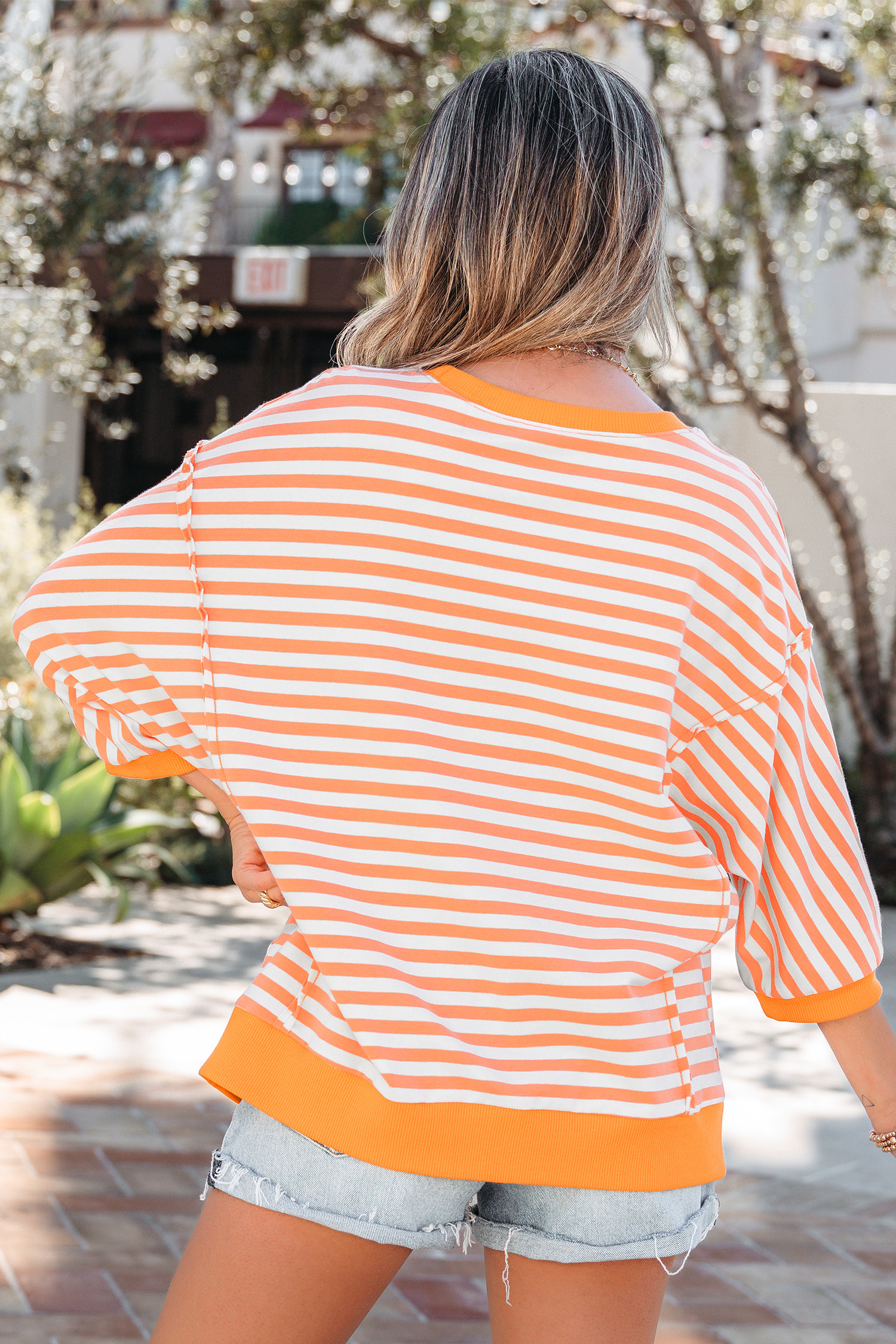 Orange Stripe 3/4 Sleeve Exposed Seam Patchwork Pullover Top LC25230260