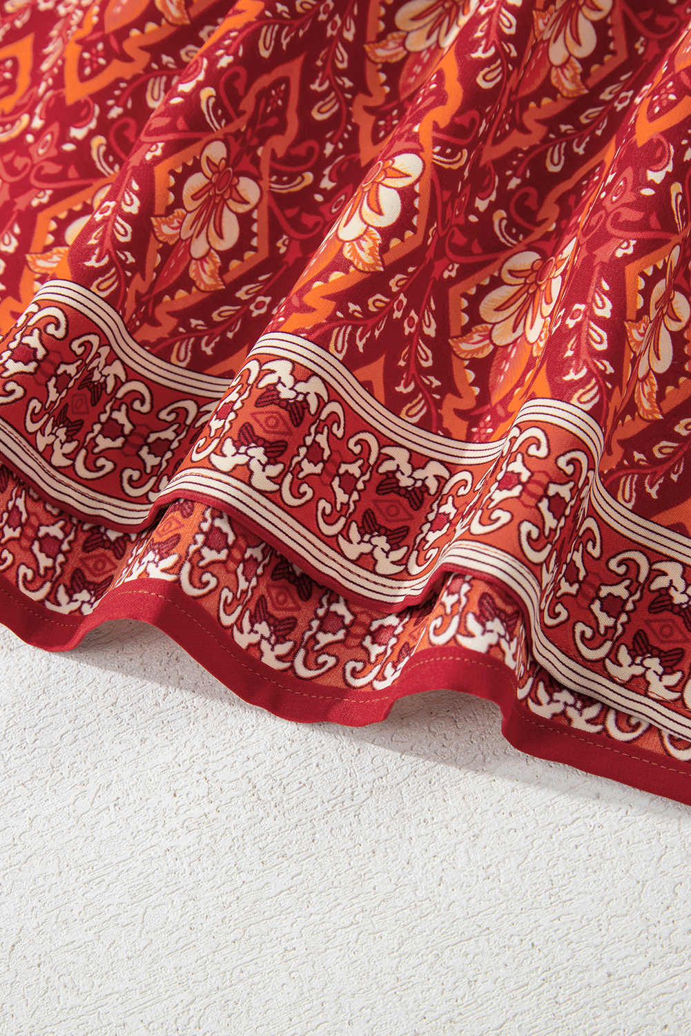 Plus Size Orange  Printed Surplice Neck Empire Waist Flowy Mini Dress