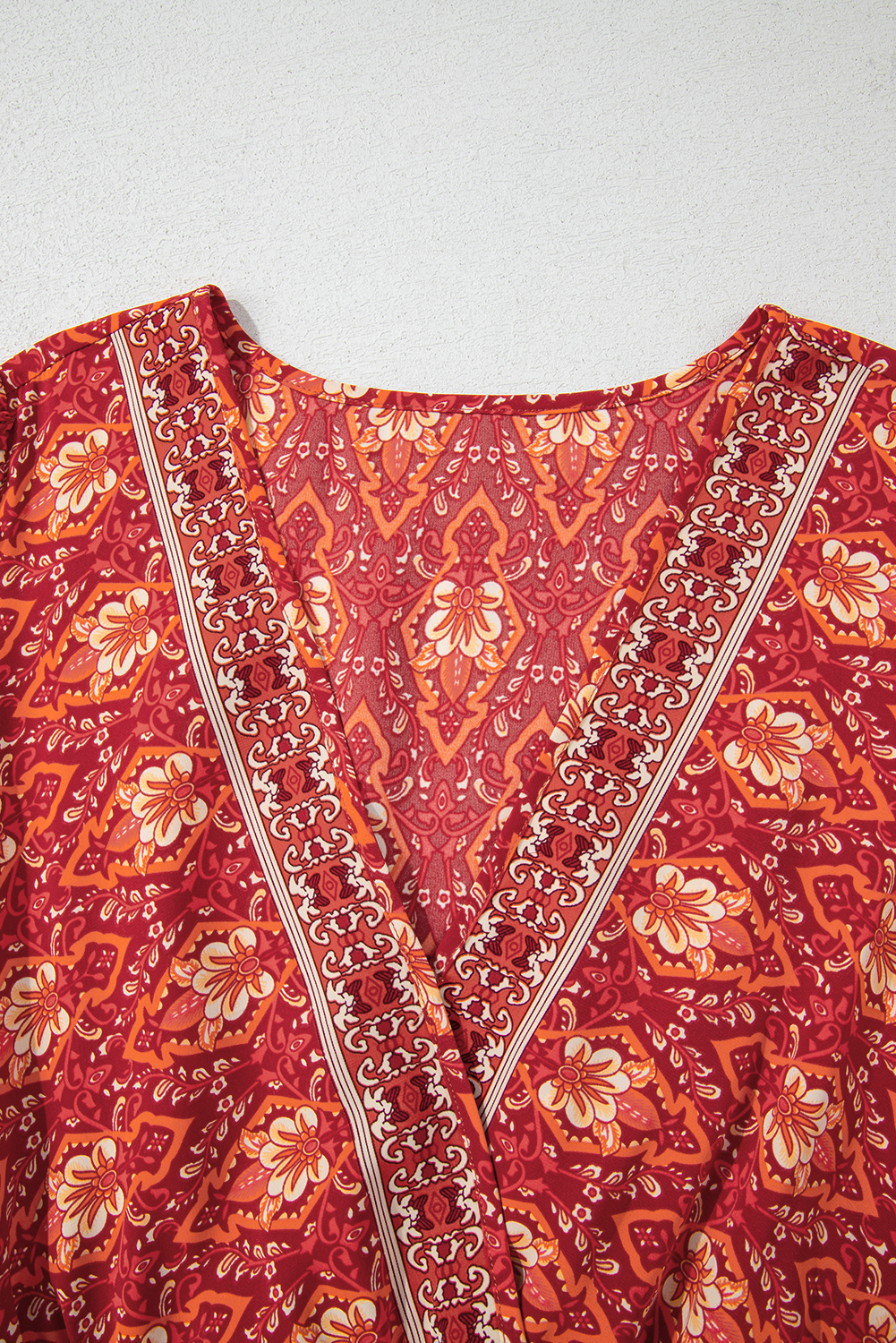 Plus Size Orange  Printed Surplice Neck Empire Waist Flowy Mini Dress