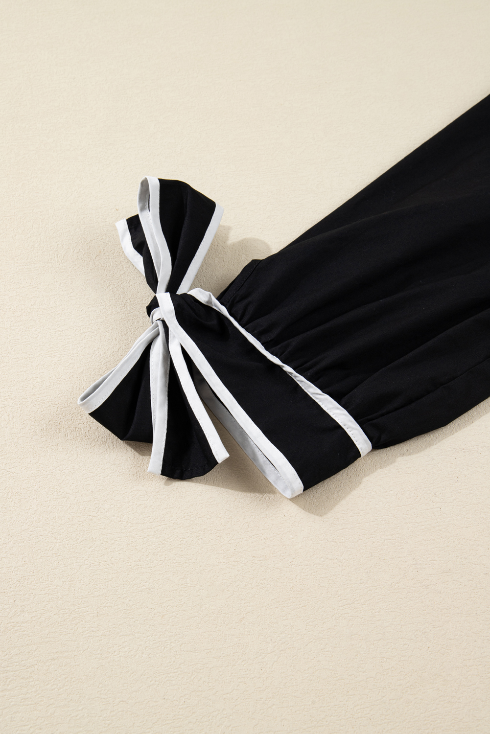 Plus Size Black Contrast Trim Knot Cuffs  V Neck Mini Dress