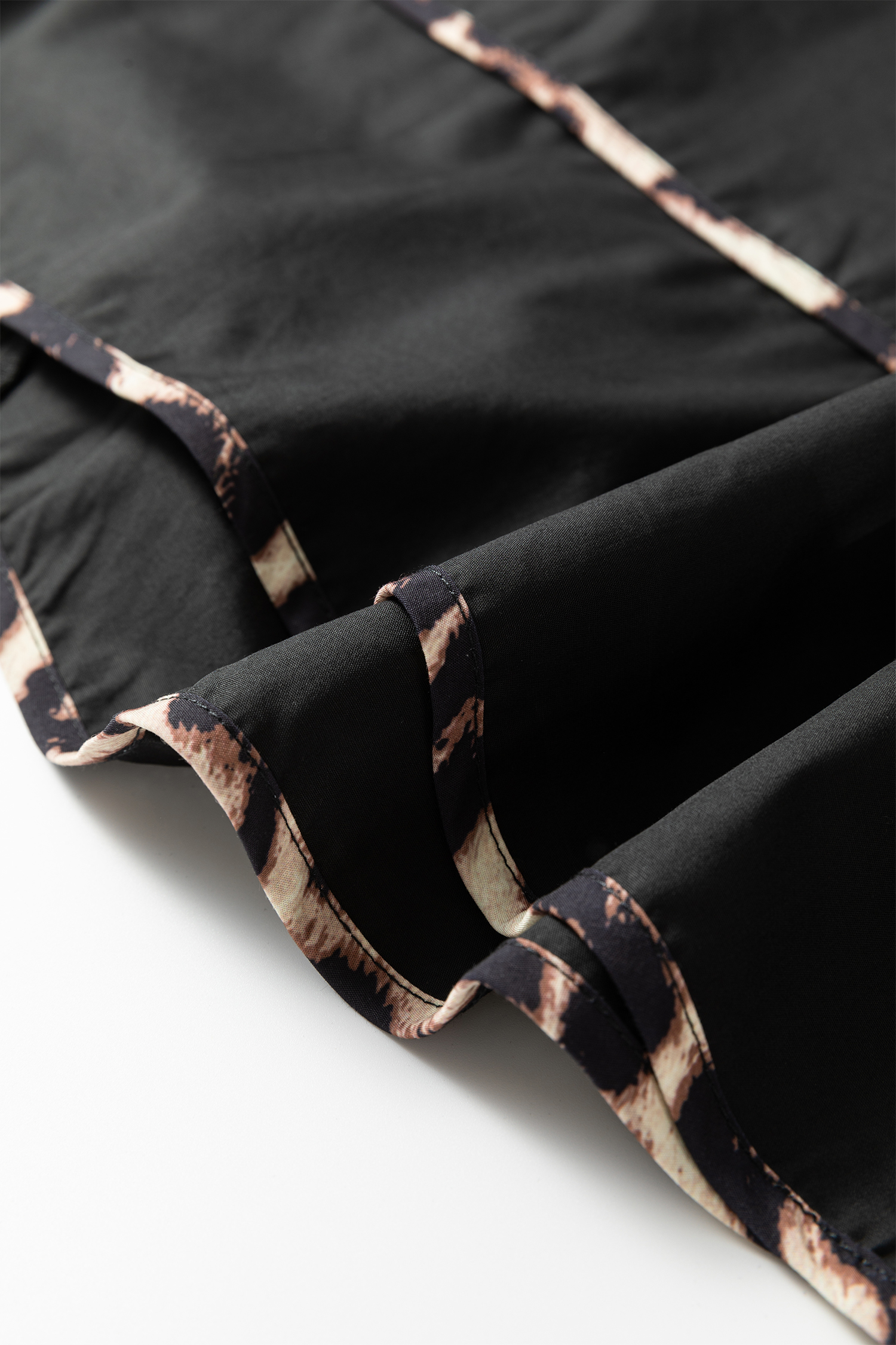 Plus Size Black  Long Sleeve Leopard Contrasted Trim Tie Neck Flared Mini Dress