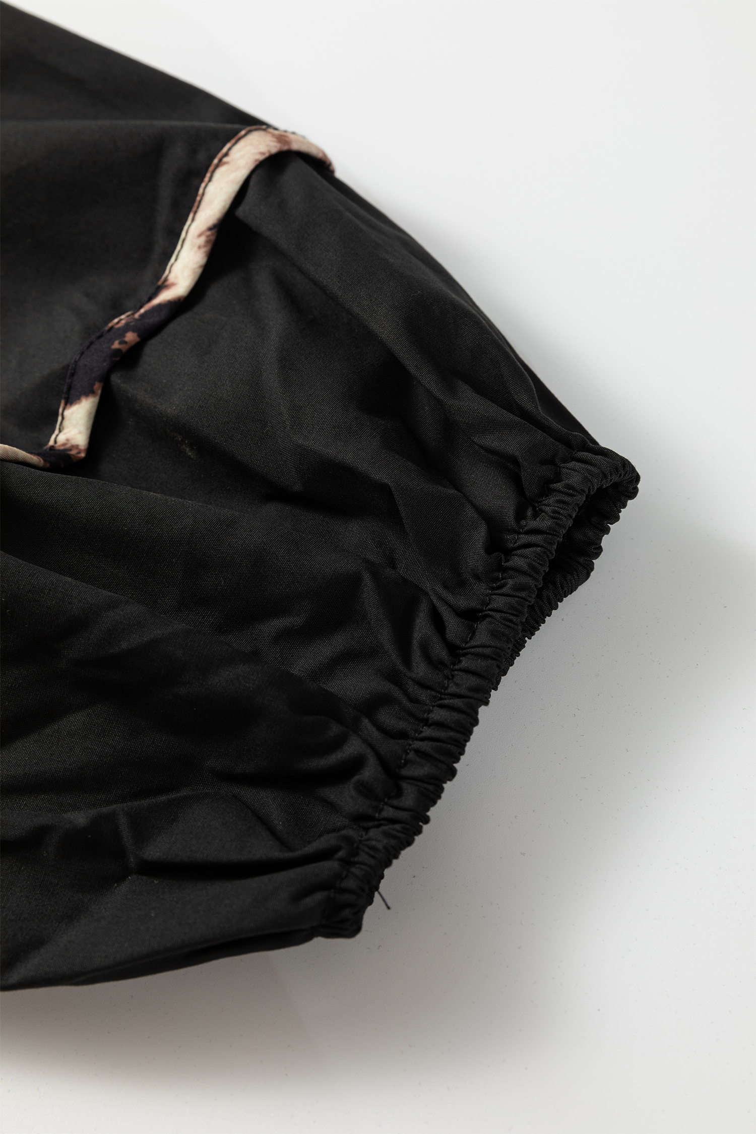 Plus Size Black  Long Sleeve Leopard Contrasted Trim Tie Neck Flared Mini Dress