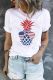 Camiseta de manga corta con estampado de piña y bandera de Estados Unidos blanca