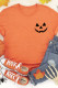 Camiseta gráfica de manga corta con estampado de cara divertida naranja