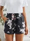 Pantalones cortos con bolsillos de cintura elástica casual con cordón estampado floral negro