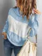 Suéter de punto suelto con cuello alto en bloques de color azul
