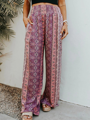 Pantalones de pernera ancha estampados con fruncido morado