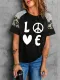 Camiseta de patchwork a rayas de leopardo con estampado gráfico Hippie Love negro